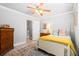 Comfortable bedroom with dresser, bedside table, rug and plenty of natural light at 1713 Boone Hall Dr # I9, Charleston, SC 29407
