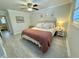 Comfortable main bedroom featuring soft lighting, a ceiling fan, and neutral decor at 1713 Boone Hall Dr # I9, Charleston, SC 29407
