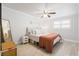 Comfortable bedroom featuring neutral tones, a ceiling fan, and ample natural light at 1713 Boone Hall Dr # I9, Charleston, SC 29407