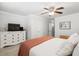 Bedroom offers a dresser with television and ceiling fan, with great natural lighting at 1713 Boone Hall Dr # I9, Charleston, SC 29407