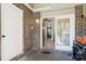 Outdoor patio features a grilling area with view into the open concept living area at 1713 Boone Hall Dr # I9, Charleston, SC 29407