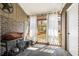 Enclosed screened porch with brick accent wall and access to backyard at 1713 Boone Hall Dr # I9, Charleston, SC 29407