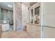 Hallway view of stunning bath featuring walk-in shower and freestanding tub at 1714 Middle St, Sullivans Island, SC 29482