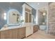 Modern bathroom with double vanity, soaking tub, and stunning tile work at 1714 Middle St, Sullivans Island, SC 29482