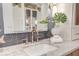 Elegant bathroom vanity with marble countertop, stylish faucet, and decorative accents at 1714 Middle St, Sullivans Island, SC 29482