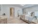 Comfortable bedroom showcasing natural light and a view into an ensuite bathroom at 1714 Middle St, Sullivans Island, SC 29482