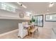 Basement dining area featuring a wooden table, bench, and chairs, with natural light at 1714 Middle St, Sullivans Island, SC 29482