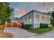 Charming home with a well-manicured lawn, mature landscaping and a paved driveway at 1714 Middle St, Sullivans Island, SC 29482