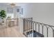 Bright hallway features a cozy nook with a desk, a comfortable chair, and a lovely plant at 1714 Middle St, Sullivans Island, SC 29482