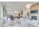Spacious open floor plan with dining and living areas, fireplace, and bright natural light at 1714 Middle St, Sullivans Island, SC 29482