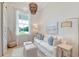 Cozy living room with natural light, comfortable seating, and decorative accents at 1714 Middle St, Sullivans Island, SC 29482