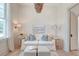 Inviting living room with a white sofa, stylish decor, and ample natural light at 1714 Middle St, Sullivans Island, SC 29482