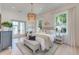 Bright and airy bedroom with lots of natural light and hardwood flooring at 1714 Middle St, Sullivans Island, SC 29482