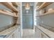 Pantry with marble countertops, open shelving, and modern appliances at 1714 Middle St, Sullivans Island, SC 29482