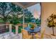 Outdoor patio with table and chairs overlooking the backyard at 1714 Middle St, Sullivans Island, SC 29482