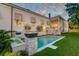 Beautiful backyard showcasing a modern pool, elegant water feature, and manicured landscaping at 1714 Middle St, Sullivans Island, SC 29482