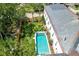 Aerial view of stunning backyard pool with manicured landscaping and privacy fence at 1714 Middle St, Sullivans Island, SC 29482
