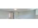 Empty room with a light blue-green walls, recessed lighting, and hardwood floors at 1714 Middle St, Sullivans Island, SC 29482