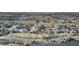Scenic aerial view of waterfront homes along a creek with lush green lawns under a bright sunny day at 1739 Indigo Island Dr, Hanahan, SC 29410