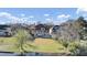 Scenic aerial shot of exquisite waterfront homes with manicured lawns and serene creek views, perfect for luxury living at 1739 Indigo Island Dr, Hanahan, SC 29410