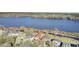 Stunning aerial view of waterfront homes along a beautiful blue lake offering serene and picturesque scenery at 1739 Indigo Island Dr, Hanahan, SC 29410