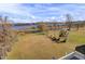 Aerial view of a large grass yard leading to a body of water at 1739 Indigo Island Dr, Hanahan, SC 29410