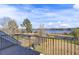 Balcony with railings overlooking lush landscape and a serene lake at 1739 Indigo Island Dr, Hanahan, SC 29410