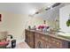 Spacious bathroom featuring double vanity with unique, decorative wooden cabinetry and sinks at 1739 Indigo Island Dr, Hanahan, SC 29410