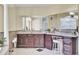 A spacious bathroom featuring a vanity with a large mirror and dual sinks, complemented by stylish decor at 1739 Indigo Island Dr, Hanahan, SC 29410