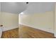 This bedroom offers gleaming hardwood floors, a ceiling fan, neutral paint, and an open floor plan at 1739 Indigo Island Dr, Hanahan, SC 29410