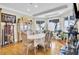 Bright dining room with large windows and a beautiful display cabinet, ideal for Gathering gatherings at 1739 Indigo Island Dr, Hanahan, SC 29410