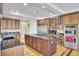 Gourmet kitchen featuring a large island, stainless steel appliances, and custom cabinetry at 1739 Indigo Island Dr, Hanahan, SC 29410