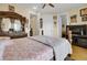 Comfortable main bedroom with wood floors, ensuite, and decorative furnishings at 1739 Indigo Island Dr, Hanahan, SC 29410