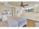 Inviting main bedroom with hardwood floors, tray ceilings, and decoratively painted walls at 1739 Indigo Island Dr, Hanahan, SC 29410