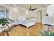 Main bedroom with hardwood floors, tray ceiling, and walk-in closet and desk area at 1739 Indigo Island Dr, Hanahan, SC 29410