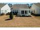 An aerial image showcases the property's backyard featuring a pergola-covered patio at 192 Sea Lavender Ln, Summerville, SC 29486