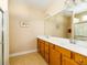 Bathroom with double sink vanity, wooden cabinets and walk in shower at 192 Sea Lavender Ln, Summerville, SC 29486