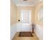 A bright foyer, decorated with a patterned rug, wainscoting, and decorative details at 192 Sea Lavender Ln, Summerville, SC 29486