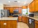 Bright kitchen with stainless steel appliances, granite countertops and tile backsplash at 192 Sea Lavender Ln, Summerville, SC 29486