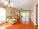 Bright living room featuring hardwood floors, ample natural light, and comfortable seating at 192 Sea Lavender Ln, Summerville, SC 29486