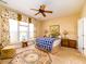 Sunlit main bedroom with large windows and decorative rug at 192 Sea Lavender Ln, Summerville, SC 29486