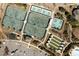 Overhead shot of tennis courts and parking area, highlighting the recreational amenities at 192 Sea Lavender Ln, Summerville, SC 29486