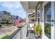 Charming balcony with relaxing seat, potted plant, and scenic neighborhood views at 1930 Carolina Towne Ct, Mount Pleasant, SC 29464