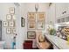 Charming bathroom with eclectic art display, granite counters, and a comfortable sitting area at 1930 Carolina Towne Ct, Mount Pleasant, SC 29464