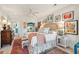 Bright bedroom featuring a large bed, accent rugs, and stylish furnishings at 1930 Carolina Towne Ct, Mount Pleasant, SC 29464