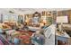 Stylish living room featuring comfortable seating, eclectic decor, and hardwood floors at 1930 Carolina Towne Ct, Mount Pleasant, SC 29464