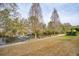 Scenic view of the community pond with a fountain and walking path at 1930 Carolina Towne Ct, Mount Pleasant, SC 29464