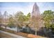 Scenic view of the tranquil waterway surrounded by lush trees and natural landscape at 1930 Carolina Towne Ct, Mount Pleasant, SC 29464
