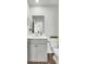 Bright bathroom featuring a new vanity and toilet with a decorative plant at 202 N Light Way, Summerville, SC 29486