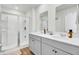 Modern bathroom with double sink vanity, sleek shower, and ample counter space at 202 N Light Way, Summerville, SC 29486